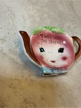 Vintage “I Will Hold Your Teabag” pink anthropomorphic teapot shaped holder
